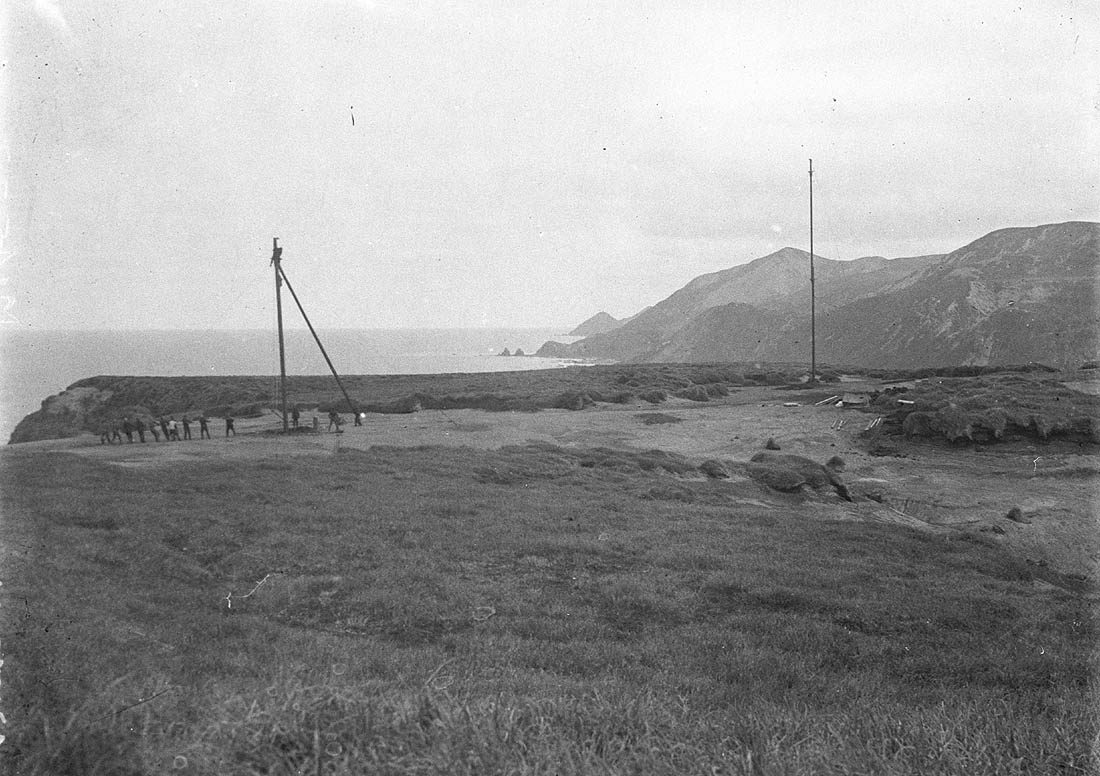 Erecting the wireless masts at Macquarie Island